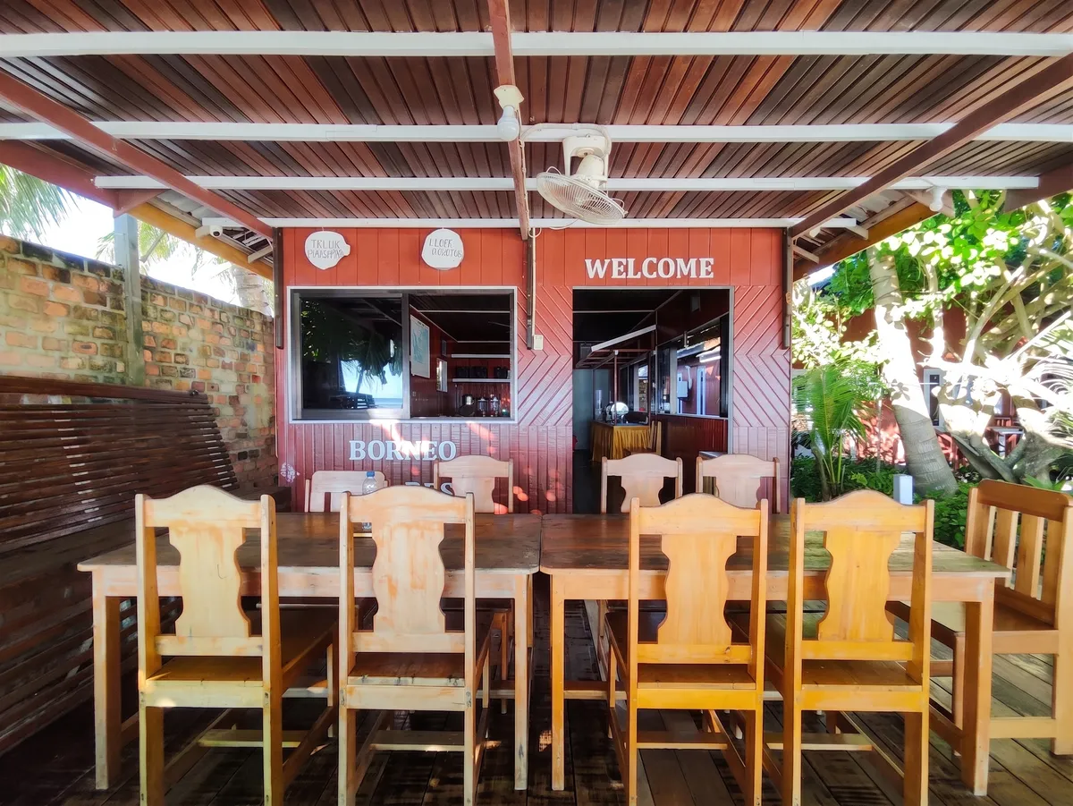 Kitchen and Dining at Borneo Cottage Maratua